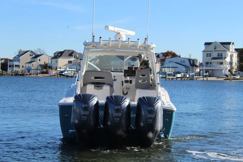 Mary Michele Yacht Photos Pics 2022 Albemarle 30 Express boat with triple 300 V6 engines on a sunny day.