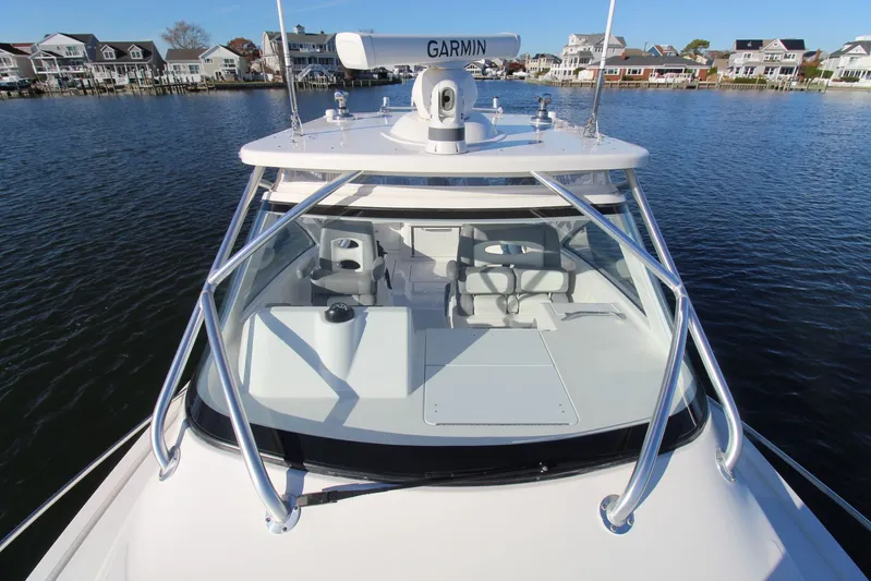 Mary Michele Yacht Photos Pics 2022 Albemarle 30 Express boat on water, featuring Garmin equipment and sleek design.