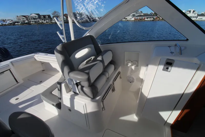 Mary Michele Yacht Photos Pics 2022 Albemarle 30 Express boat interior with seating and water view.