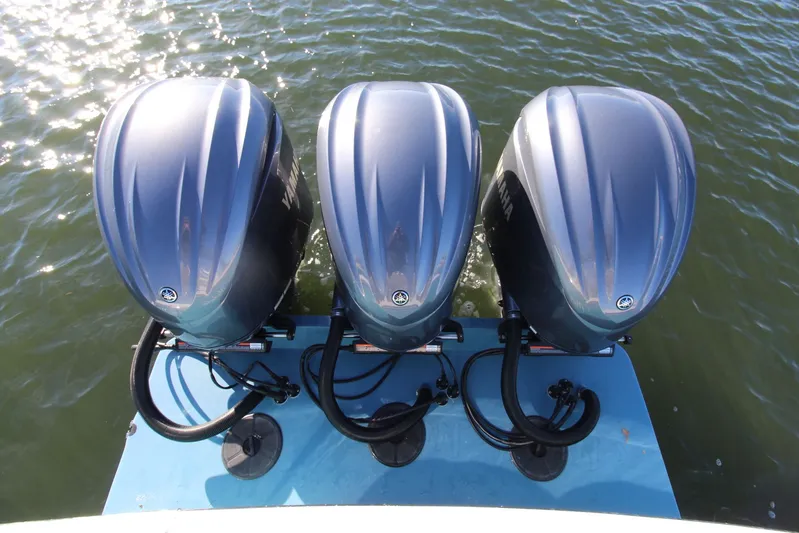 Mary Michele Yacht Photos Pics Triple Yamaha outboard engines on a 2022 Albemarle 30 Express boat, viewed from above.