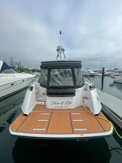  Yacht Photos Pics 2018 Beneteau Gran Turismo 40 yacht docked in marina, rear view.