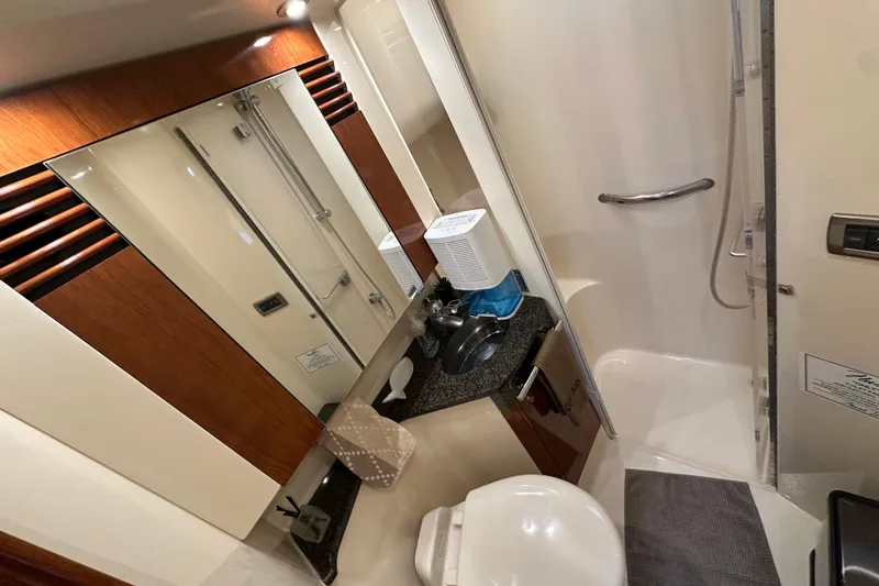 Our Alibi Yacht Photos Pics Luxurious bathroom interior of 2004 Sea Ray 420 Sedan Bridge yacht.