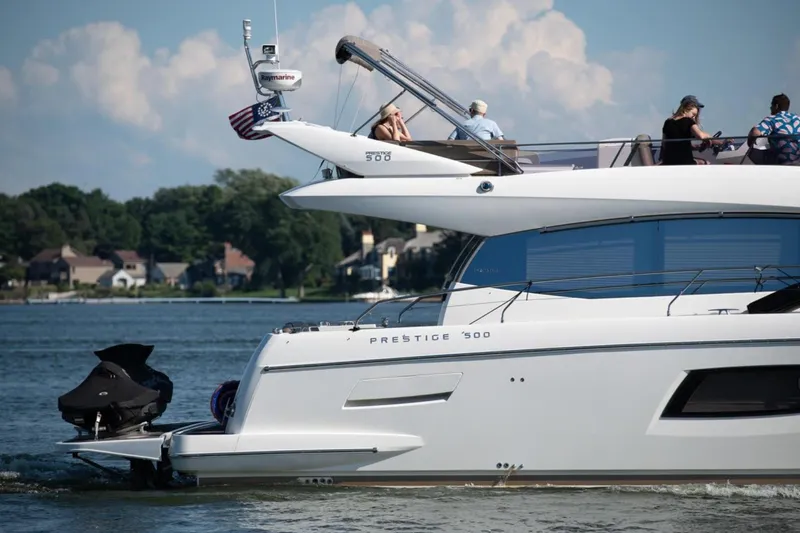  Yacht Photos Pics Luxury 2012 Prestige 500 yacht cruising with passengers on a sunny day.