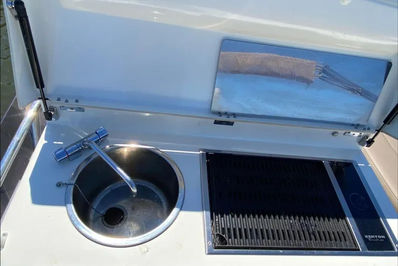  Yacht Photos Pics Outdoor sink and grill on a 2012 Prestige 500 yacht deck.