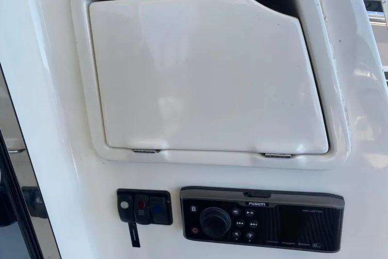  Yacht Photos Pics Control panel on a 2012 Prestige 500 yacht, featuring a Fusion audio system.