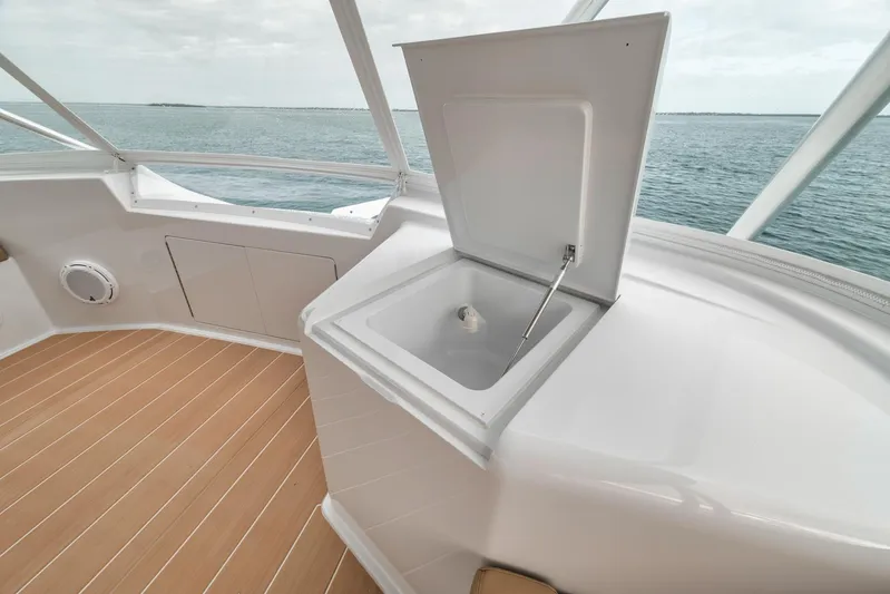  Yacht Photos Pics Open sink on 2001 Viking 65 yacht deck with ocean view.