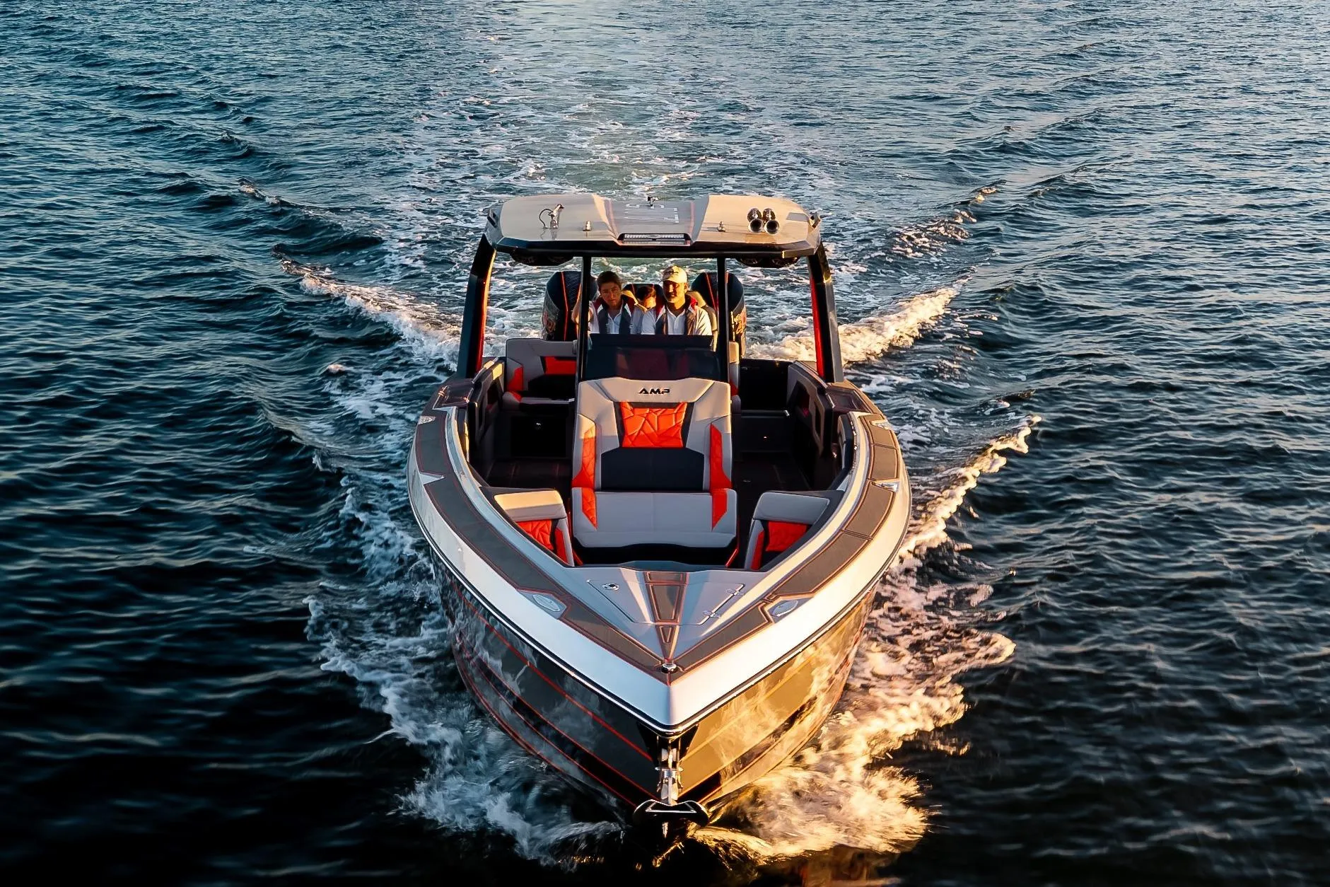 2026 AMP 333 boat cruising on open water with passengers onboard.