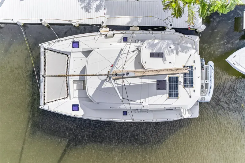  Yacht Photos Pics Aerial view of 2017 Leopard 40 catamaran docked, featuring solar panels and spacious deck.