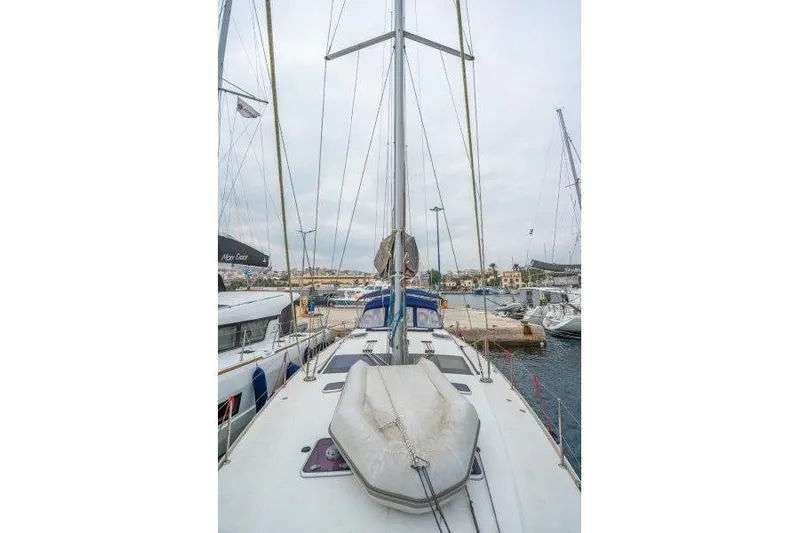  Yacht Photos Pics 2010 Jeanneau 53 sailboat docked at a marina, view from the deck.