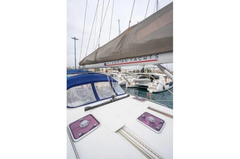  Yacht Photos Pics 2010 Jeanneau 53 yacht docked, featuring sails and deck details.