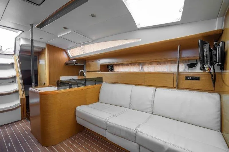  Yacht Photos Pics Interior of 2010 Jeanneau 53 yacht with modern design and comfortable seating.