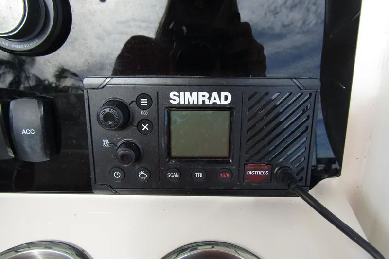  Yacht Photos Pics Simrad marine radio on 2023 Boston Whaler 280 Dauntless dashboard.