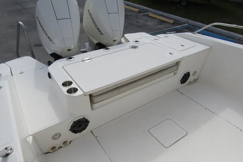  Yacht Photos Pics 2023 Boston Whaler 280 Dauntless boat deck with dual Mercury engines and seating area.