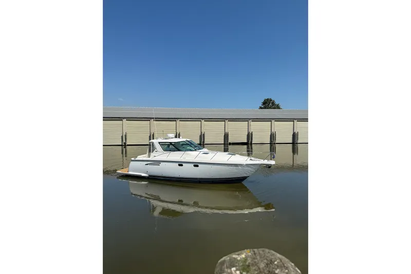  Yacht Photos Pics 2005 Tiara Yachts 3600 Sovran docked in calm waters under clear blue sky.