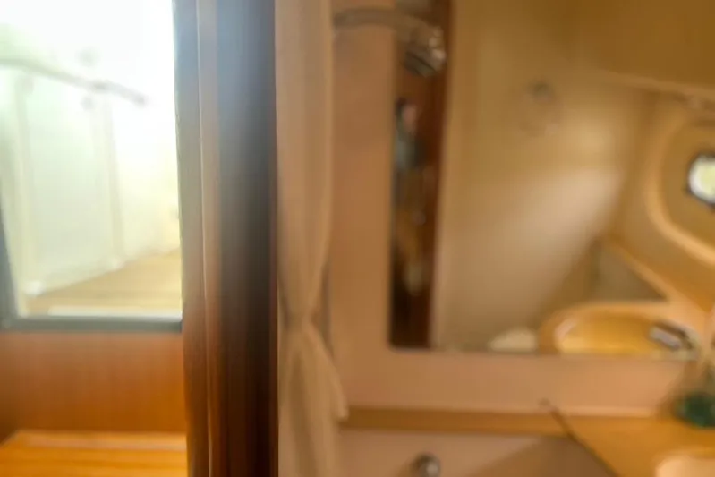  Yacht Photos Pics Interior view of 2005 Tiara Yachts 3600 Sovran, featuring a cozy cabin space.