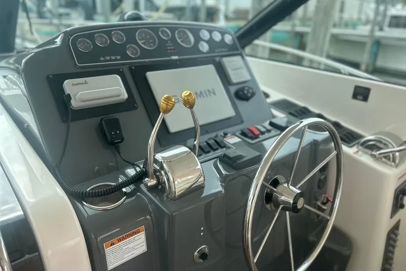  Yacht Photos Pics Helm of 2005 Tiara Yachts 3600 Sovran with Garmin navigation system and dual throttle controls.