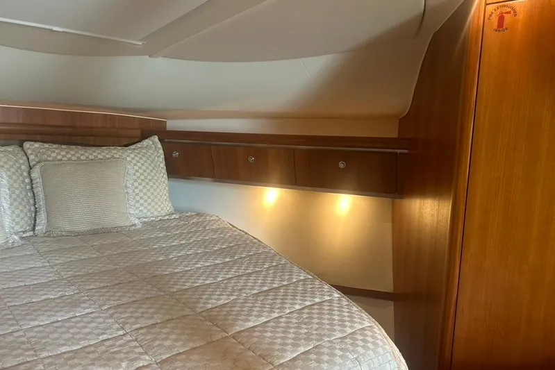  Yacht Photos Pics Luxurious cabin interior of 2005 Tiara Yachts 3600 Sovran with cozy bedding.