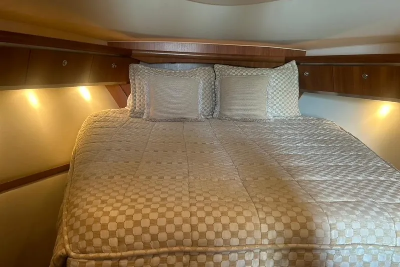  Yacht Photos Pics Luxurious cabin interior of 2005 Tiara Yachts 3600 Sovran with cozy bedding.