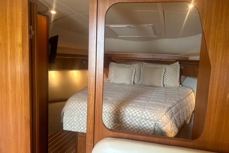  Yacht Photos Pics Luxurious cabin interior of 2005 Tiara Yachts 3600 Sovran with cozy bedding.