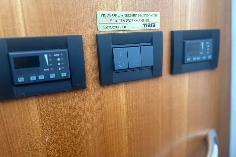  Yacht Photos Pics Control panel on 2005 Tiara Yachts 3600 Sovran, showcasing craftsmanship and design.