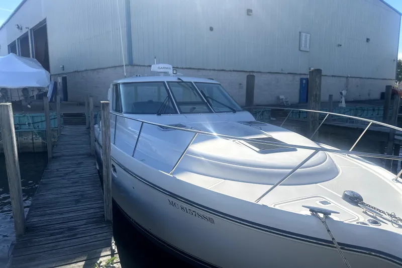  Yacht Photos Pics 2005 Tiara Yachts 3600 Sovran docked at marina, showcasing sleek design and modern features.