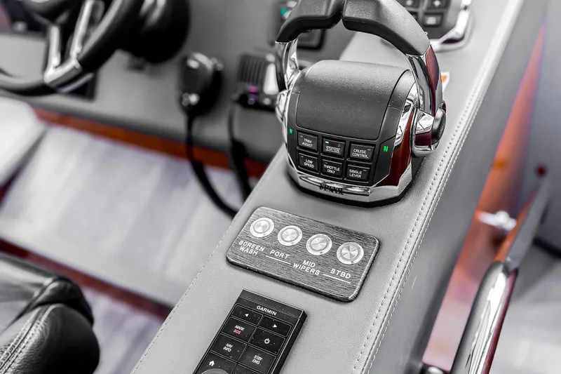 Frivolous Yacht Photos Pics Control panel of 2021 Riviera 5400 Sport Yacht Platinum Edition, featuring advanced navigation controls.