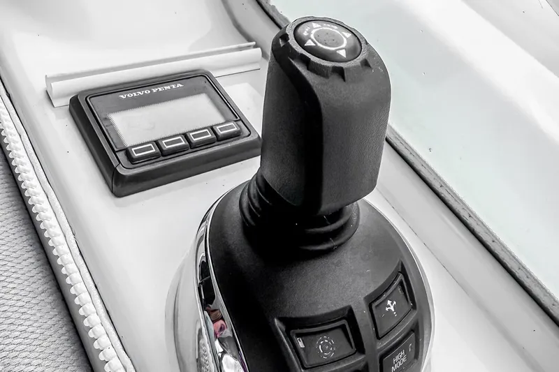 Frivolous Yacht Photos Pics Joystick control and display on 2021 Riviera 5400 Sport Yacht Platinum Edition.