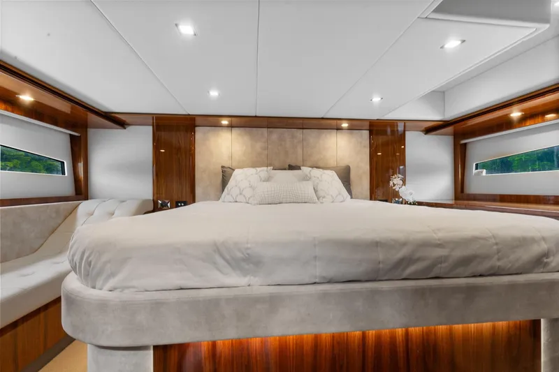 Frivolous Yacht Photos Pics Luxurious bedroom interior of 2021 Riviera 5400 Sport Yacht Platinum Edition.