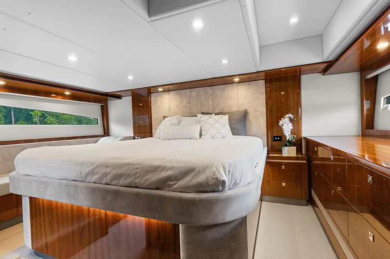 Frivolous Yacht Photos Pics Luxurious bedroom interior of 2021 Riviera 5400 Sport Yacht Platinum Edition.