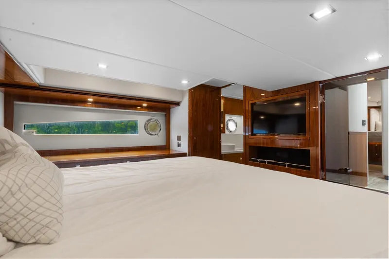 Frivolous Yacht Photos Pics Luxurious interior of 2021 Riviera 5400 Sport Yacht Platinum Edition with modern amenities.