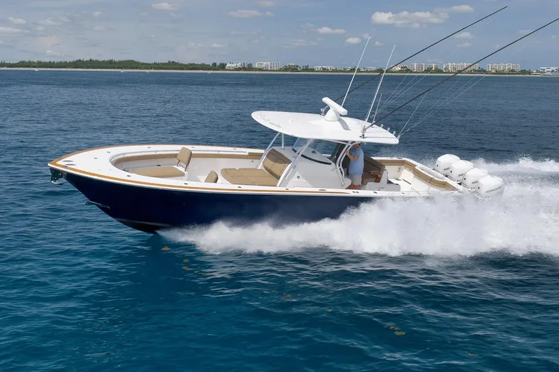  Yacht Photos Pics 2022 Valhalla Boatworks V-41 cruising on open water, showcasing sleek design and powerful engines.
