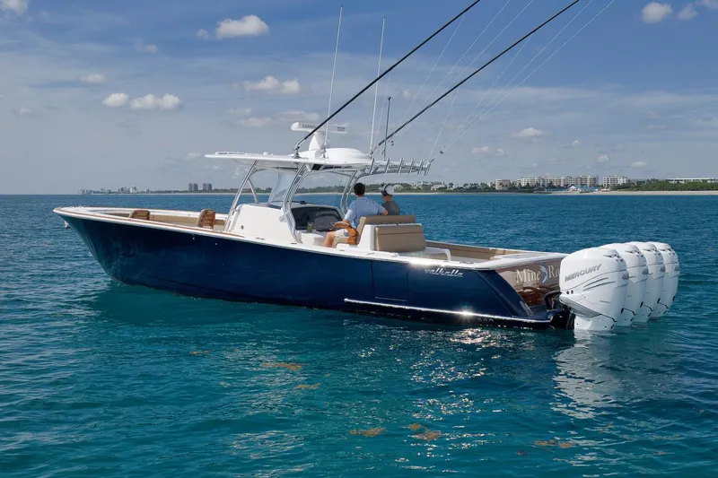  Yacht Photos Pics 2022 Valhalla Boatworks V-41 cruising on clear blue water with multiple outboard engines.
