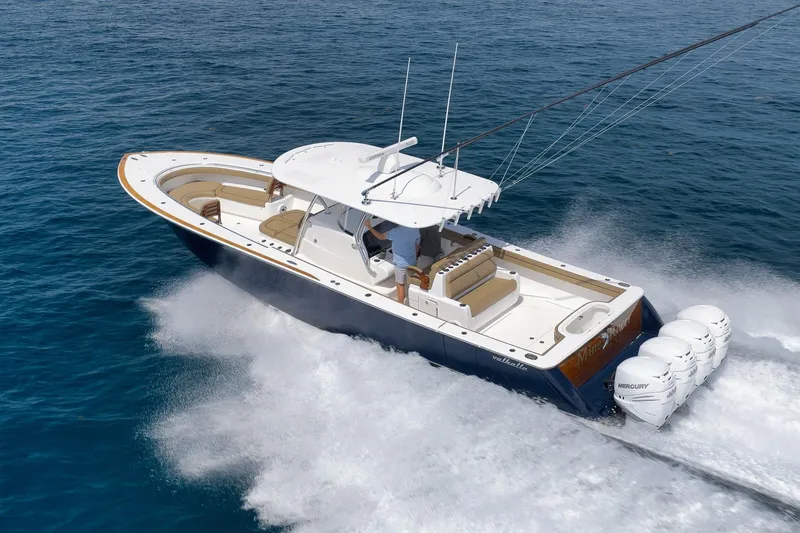  Yacht Photos Pics 2022 Valhalla Boatworks V-41 cruising on open water, showcasing sleek design and powerful engines.