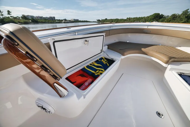  Yacht Photos Pics 2022 Valhalla Boatworks V-41 interior with open storage compartment and seating.