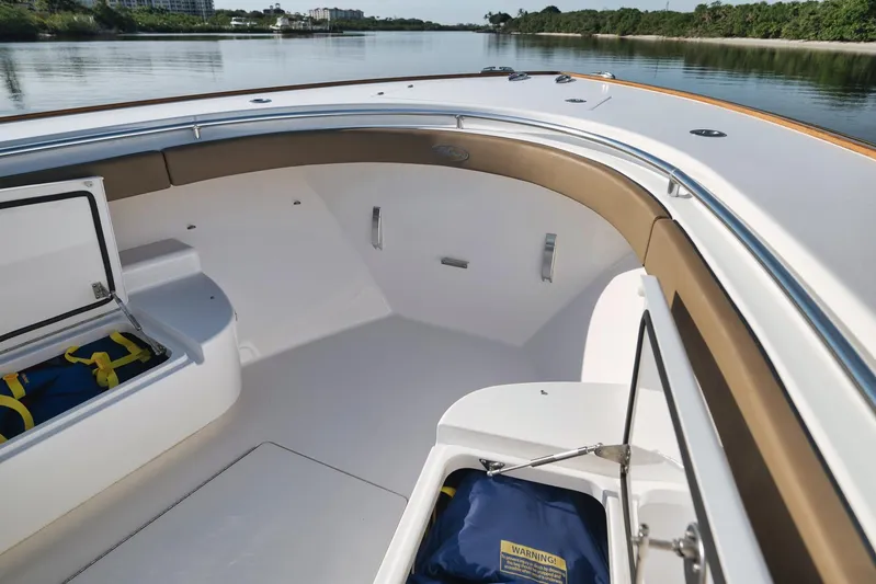  Yacht Photos Pics 2022 Valhalla Boatworks V-41 interior with open storage compartments on calm water.