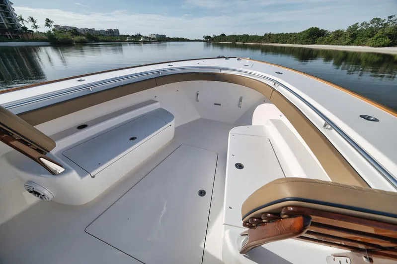  Yacht Photos Pics 2022 Valhalla Boatworks V-41 interior with seating, on a calm waterway.