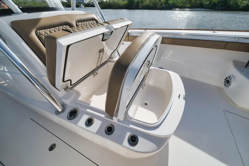  Yacht Photos Pics 2022 Valhalla Boatworks V-41 interior with open storage compartments, sleek design, and water view.