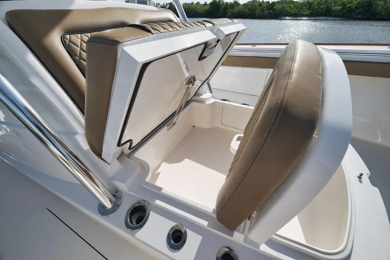  Yacht Photos Pics 2022 Valhalla Boatworks V-41 interior seating with storage compartment open.