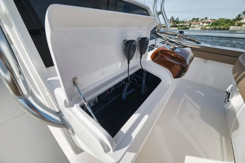  Yacht Photos Pics 2022 Valhalla Boatworks V-41 helm station with open console and communication equipment.