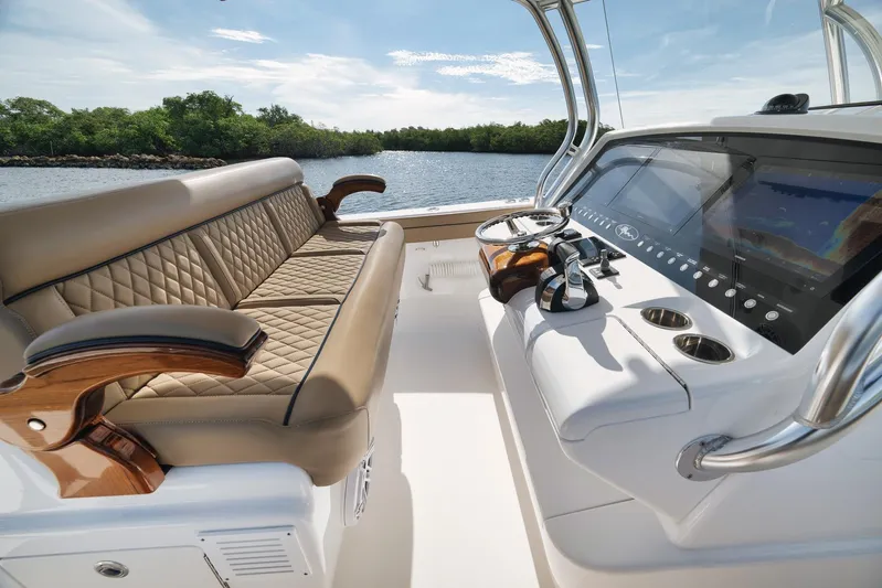  Yacht Photos Pics 2022 Valhalla Boatworks V-41 interior with luxurious seating and advanced navigation system.