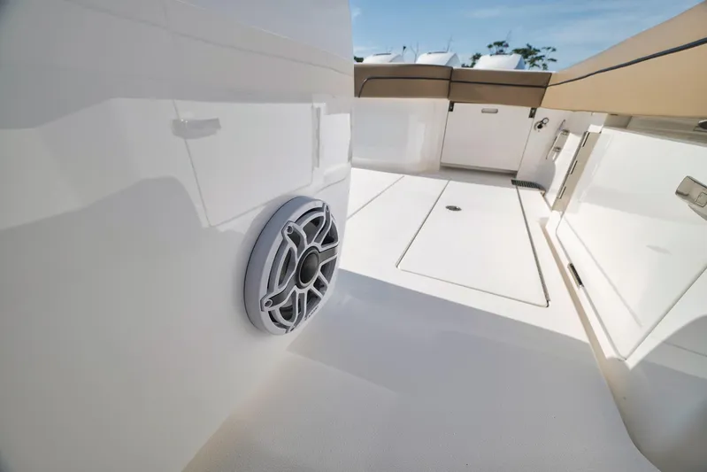  Yacht Photos Pics 2022 Valhalla Boatworks V-41 interior, featuring sleek white design and modern speaker system.
