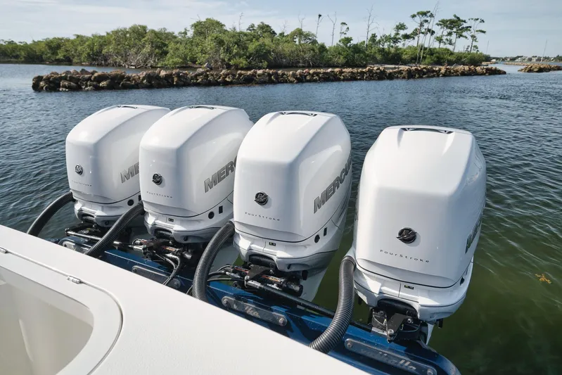  Yacht Photos Pics Four Mercury outboard engines on a 2022 Valhalla Boatworks V-41 in a scenic waterway.