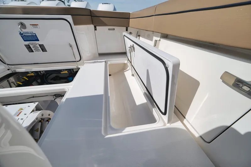  Yacht Photos Pics 2022 Valhalla Boatworks V-41 storage compartments and seating area.