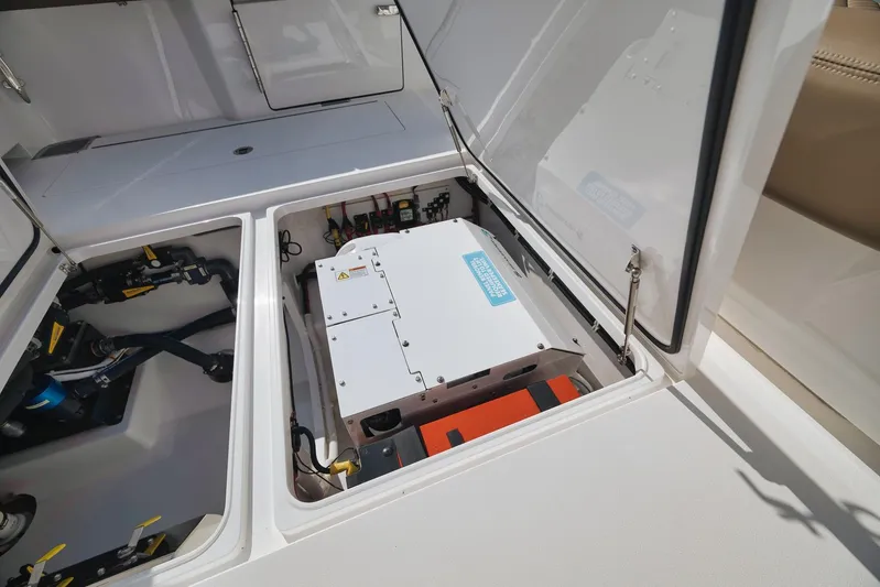  Yacht Photos Pics 2022 Valhalla Boatworks V-41 engine compartment with electrical components and storage.