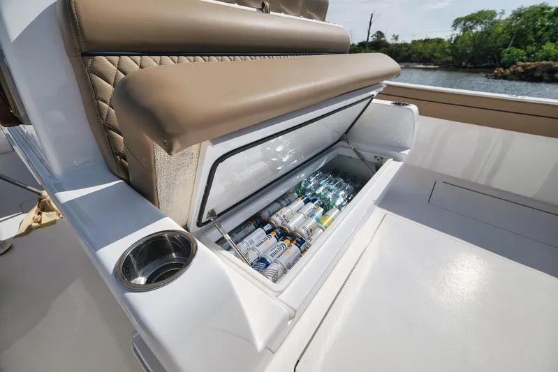  Yacht Photos Pics 2022 Valhalla Boatworks V-41 cooler with drinks, featuring luxurious seating and cup holder.