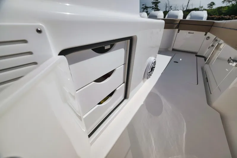  Yacht Photos Pics 2022 Valhalla Boatworks V-41 interior with storage drawers and seating area.