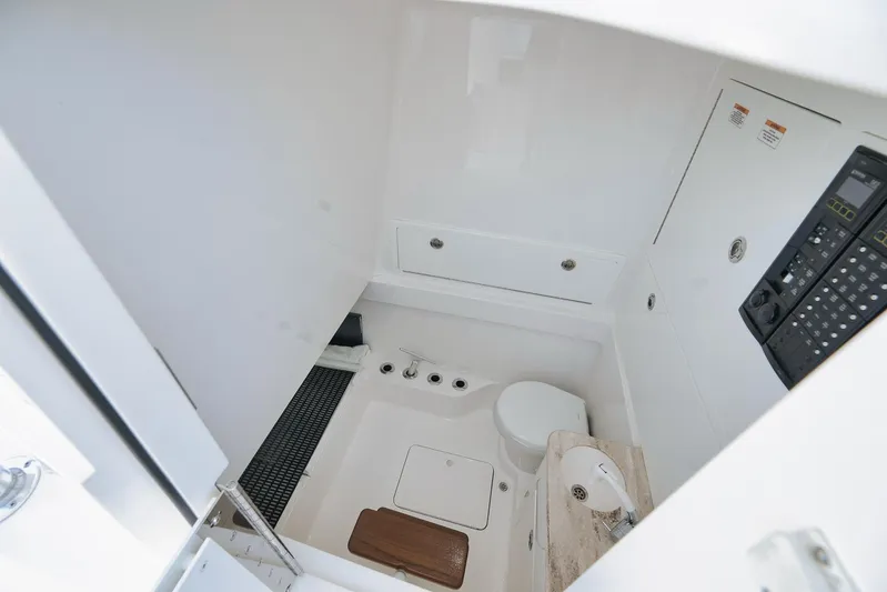  Yacht Photos Pics 2022 Valhalla Boatworks V-41 interior cabin with modern amenities and control panel.