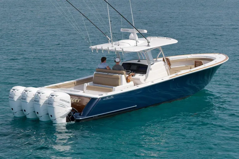  Yacht Photos Pics 2022 Valhalla Boatworks V-41 with four Mercury engines on clear blue water.