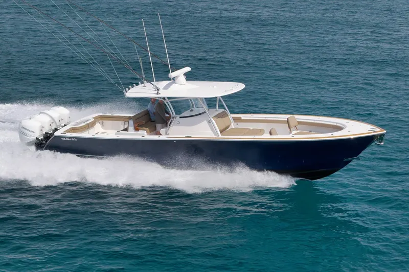  Yacht Photos Pics 2022 Valhalla Boatworks V-41 cruising on open water, showcasing sleek design and powerful engines.