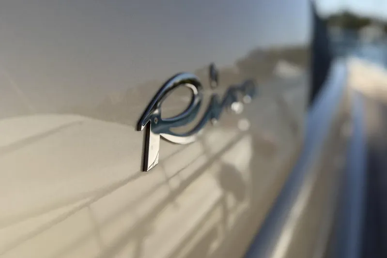 "alin 4ever" Yacht Photos Pics Close-up of 2010 Riva 68 Ego Super logo on yacht exterior.